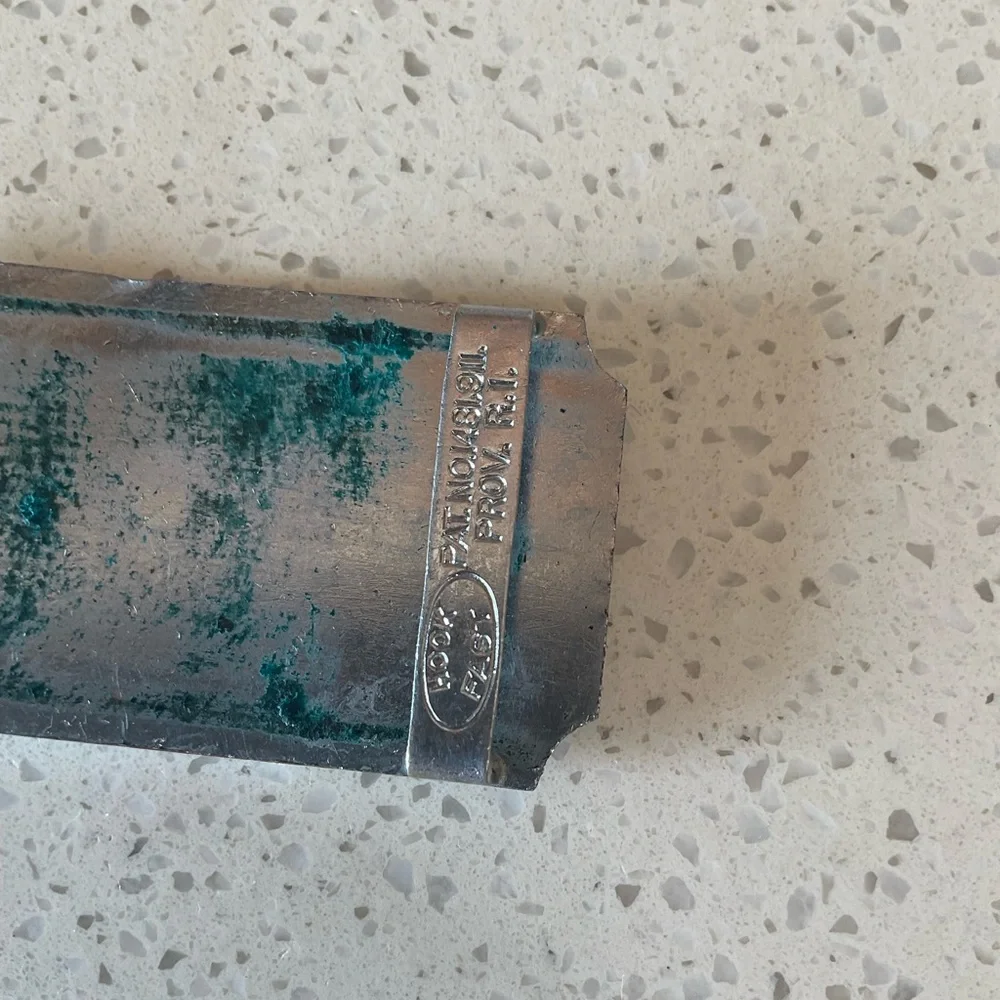 Silver and Green Belt Buckle